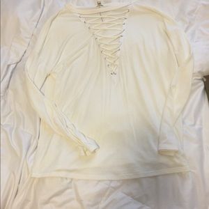 Super low cross front tee